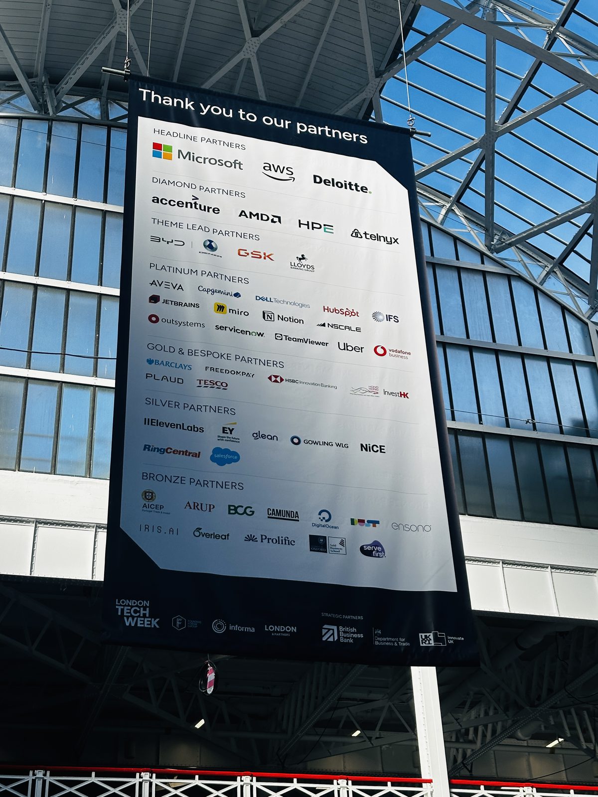 The "Thank you to our partners" banner listing the festival's sponsors
