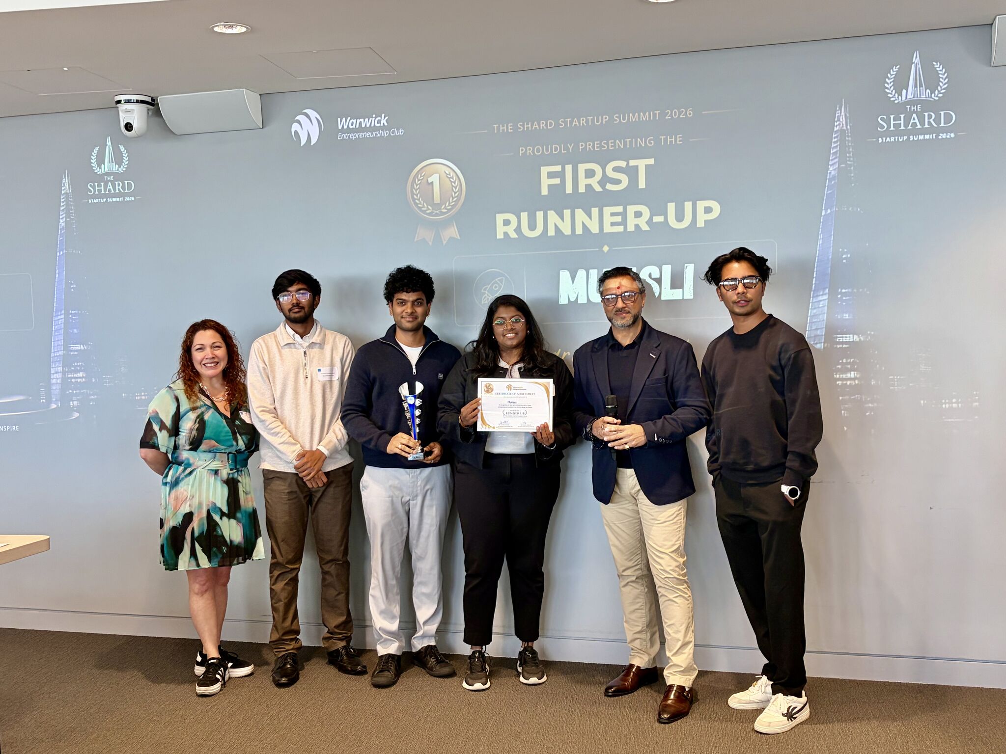 Muesli's name on screen as it is announced first runner-up at the Shard Startup Summit 2026